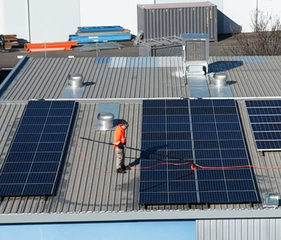 Drone footage of solar panel cleaning